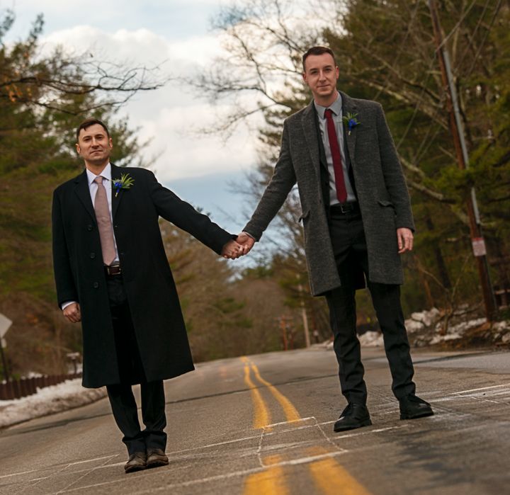 Robert W. Fieseler (left) and Ryan Leitner cross the street to Walden Pond in Concord, MA on their wedding day, March 24, 2018.
