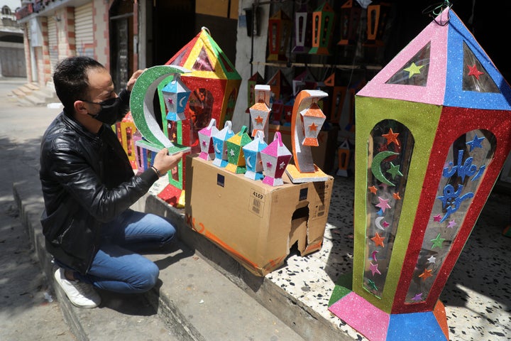 Muslims Prepare For Ramadan During Coronavirus
Pandemic 3 A Palestinian vendor wears a face mask while preparing for the Muslim holy month of Ramadan, amid concerns about the spread o
