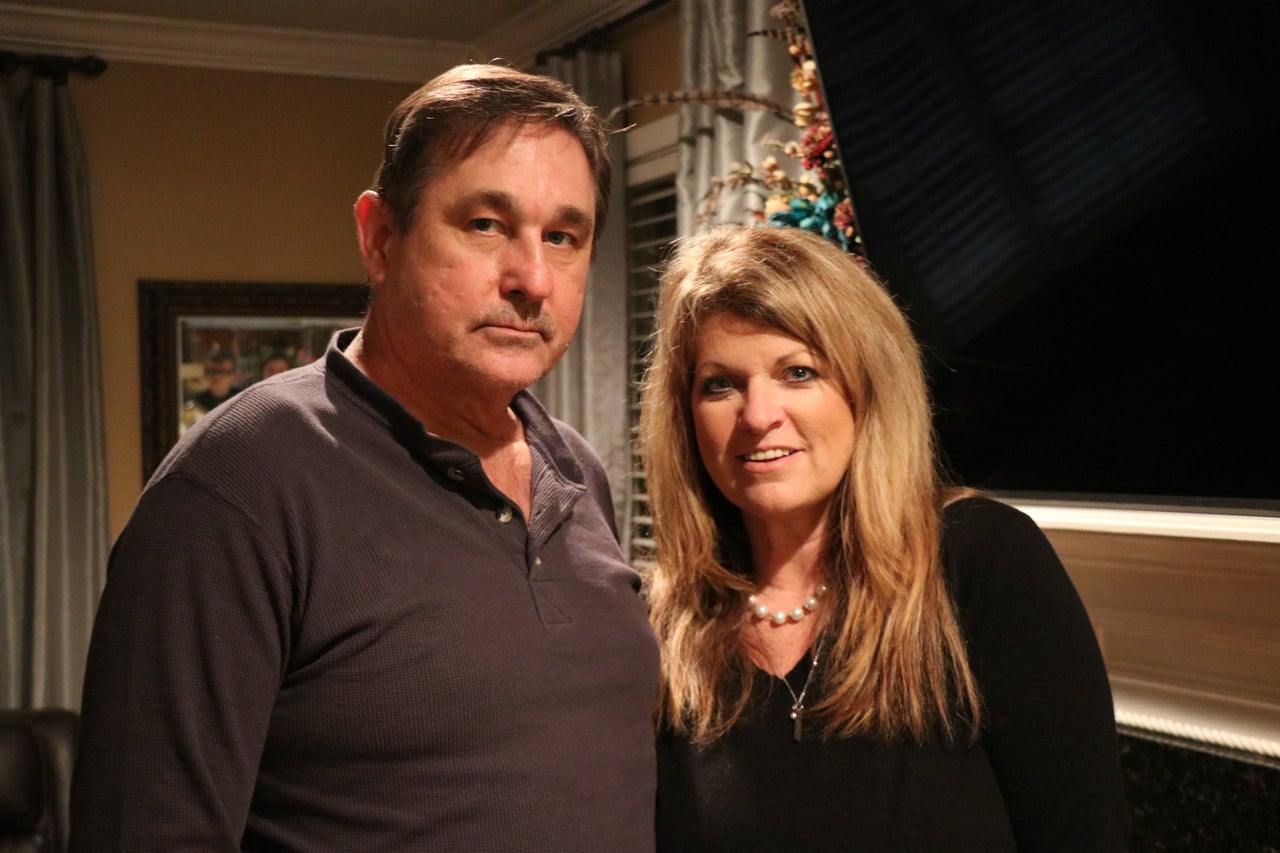 Rocky Meadows with his wife, Becky, in their home in Ocean Springs, Mississippi.