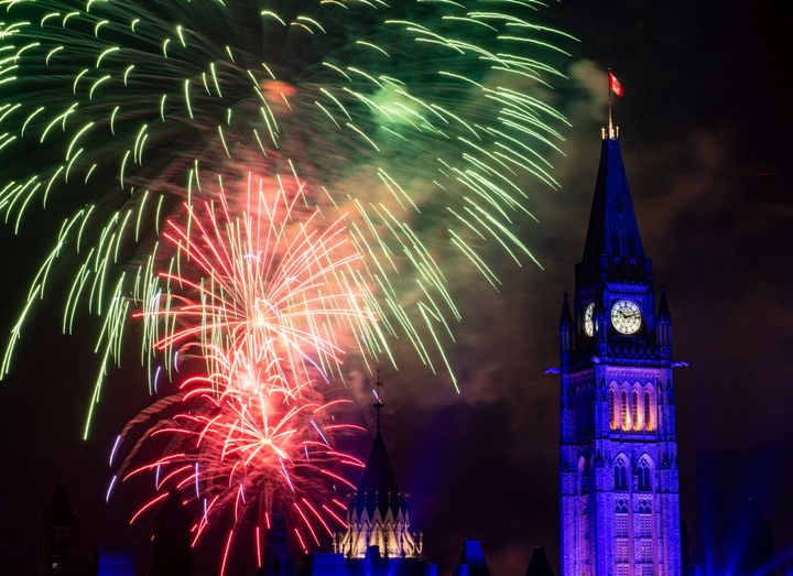 Fireworks explode above the Peace Tower and Centre Block during Canada Day celebrations on Parliament Hill in Ottawa on July 1, 2019.