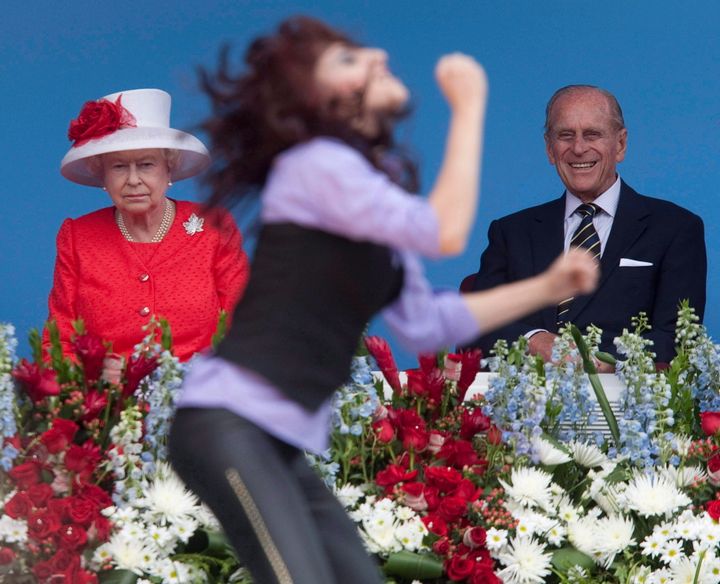Queen Elizabeth and Prince Philip watch a dancer perform during the Canada Day festivities on Parliament Hill in Ottawa on July 1, 2010. 