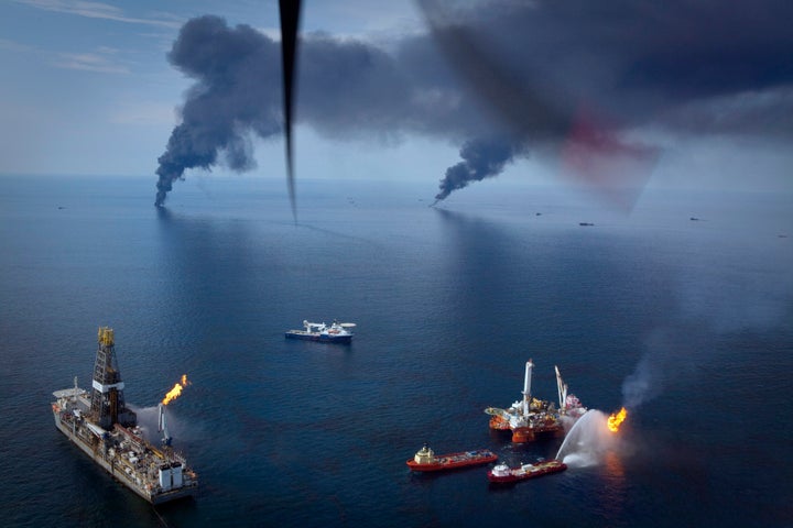 Oil is burned off the surface of the water near the source of the Deepwater Horizon spill in the Gulf of Mexico on June 19, 2010.