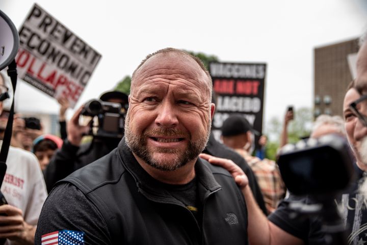 Infowars founder Alex Jones interacts with supporters at the Austin rally.