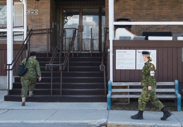 Members of the Canadian Armed Forces are shown at Residence Yvon-Brunet, a long-term care home in Montreal, on Saturday.