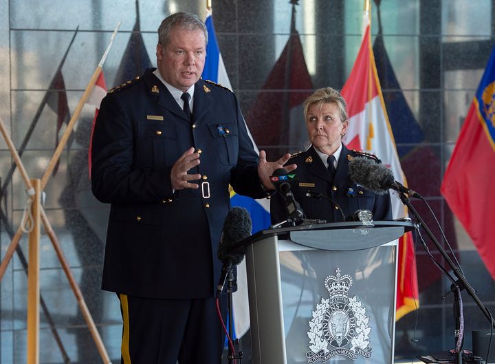 RCMP Chief Supt. Chris Leather, left, and N.S. RCMP Commanding Officer Lee Bergerman field questions at a news conference at RCMP headquarters in Dartmouth, N.S. on April 19, 2020.