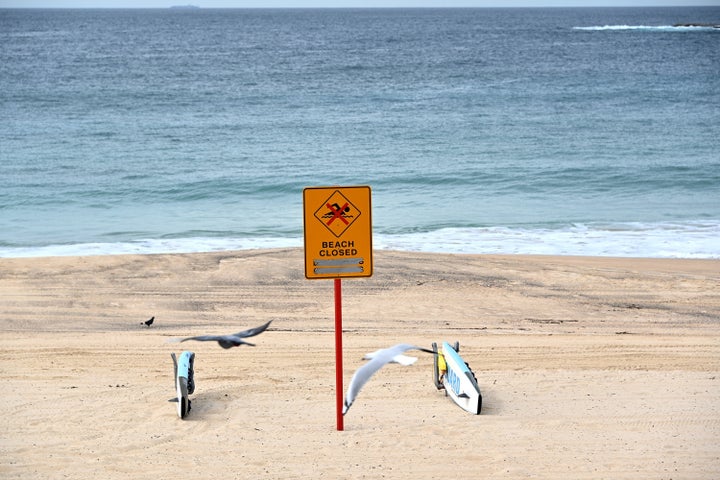 An empty Coogee beach is seen during a lock down in Sydney on April 16, 2020. - All beaches remained closed as Australia brushed aside calls for an easing of tough restrictions on travel and public gatherings despite their success in curbing the spread of COVID-19.