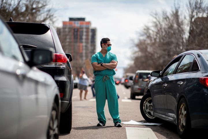 Hundreds gathered in Denver on Sunday for what they called "Operation Gridlock." A small cadre of health care workers opposed them.