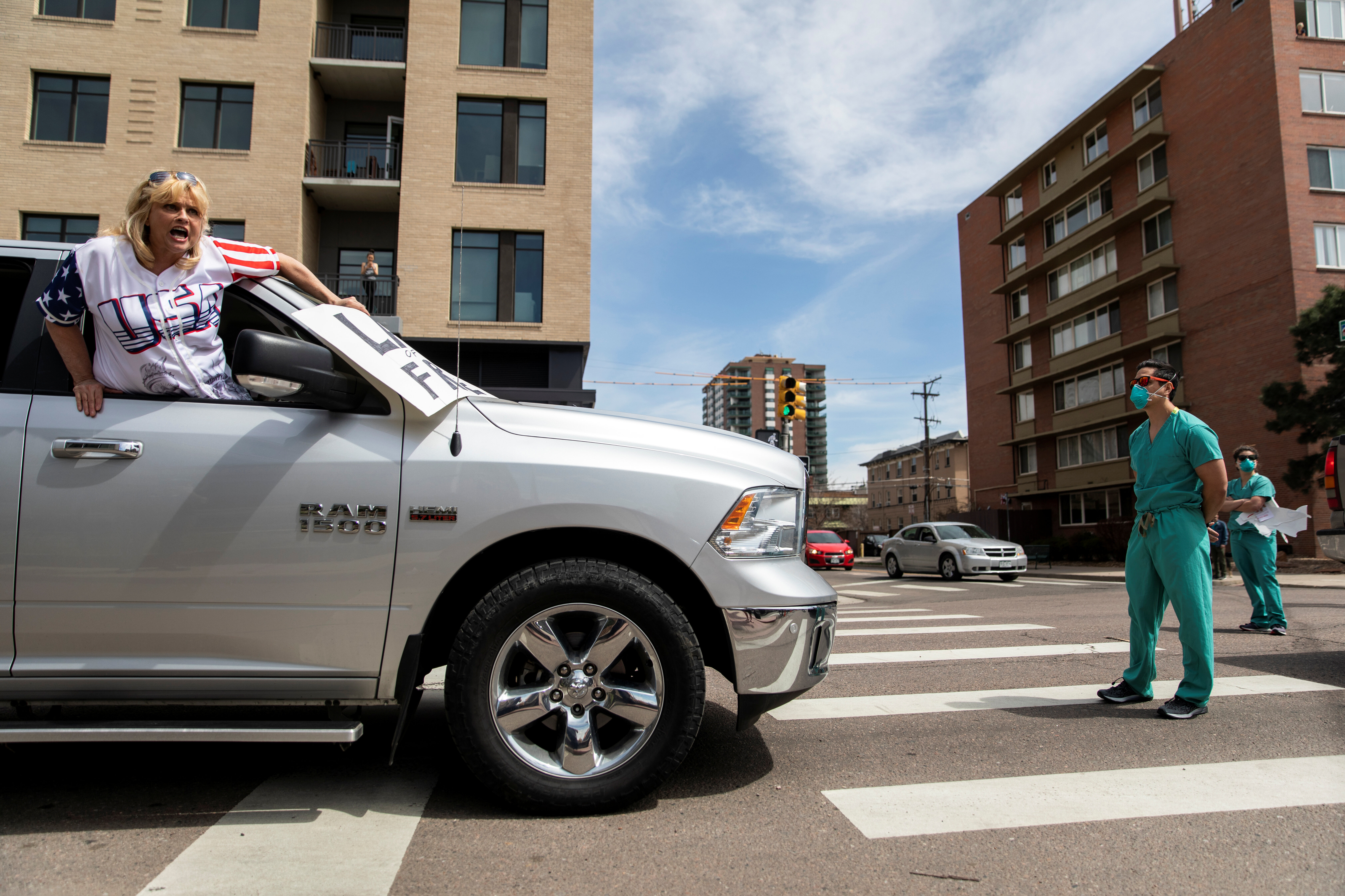 Health Care Workers Block Denver Protesters Calling For End To Stay-At ...