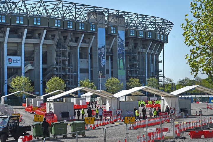 Work continues at a drive-through coronavirus testing facility which is to open at Twickenham Stadium, in south-west London, as part of the government's UK-wide drive to increase testing for thousands more NHS and other key workers.