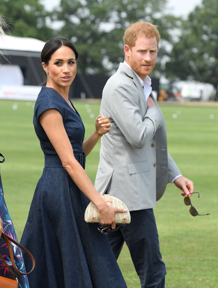 The Sussexes attend the Sentebale ISPS Handa Polo Cup at the Royal County of Berkshire Polo Club on July 26, 2018 in Windsor. 