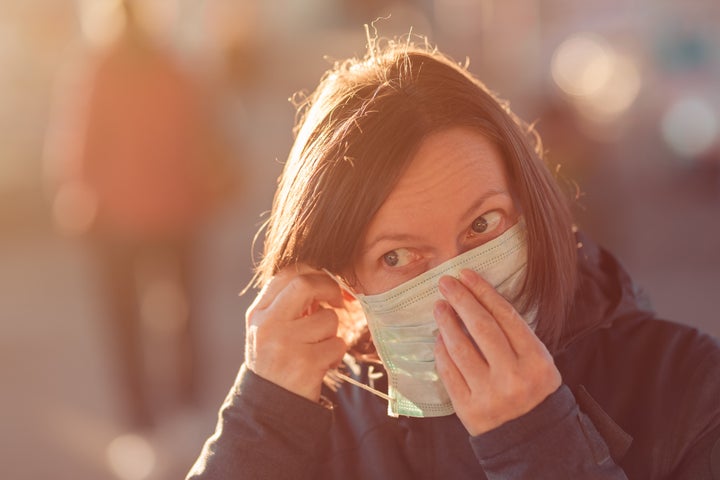 Do not touch the front of your mask with your hands after using one, because the front of the mask could be contaminated.