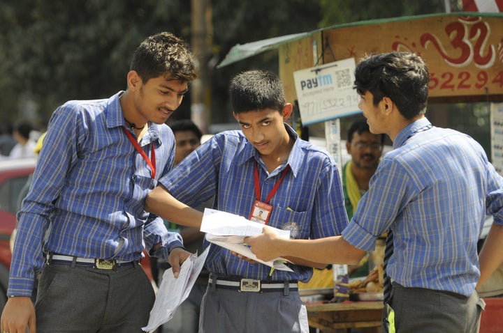 Students leave from exam centre after appearing for the Class 10th SST CBSE examination, on March 18, 2020 in Noida.