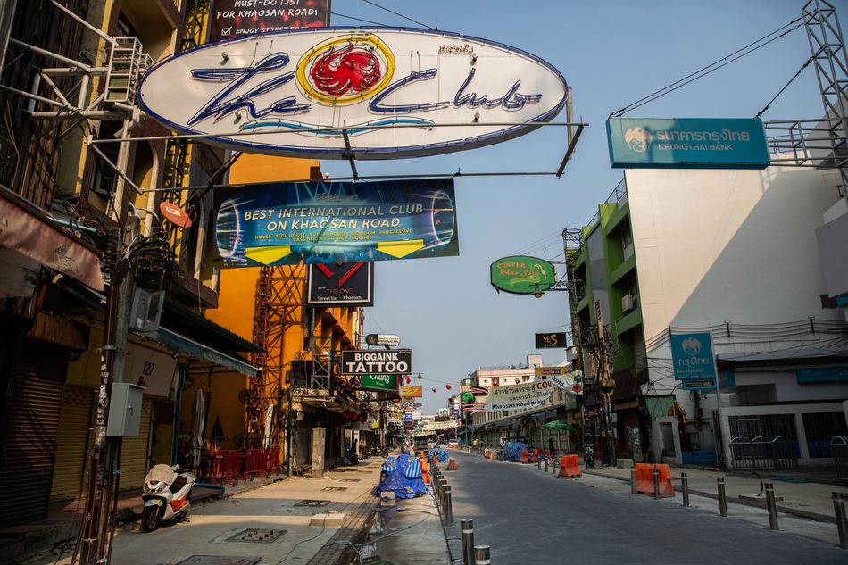 A view of empty streets, shuttered bars, and closed restaurants on Khaosan Road on April 15, 2020 in Bangkok. April 13-15 marks Songkran, Thailand's Buddhist new year celebration, when Thai people&nbsp;typically travel to the provinces to be with family or take part in large-scale water fights and parties throughout Bangkok.