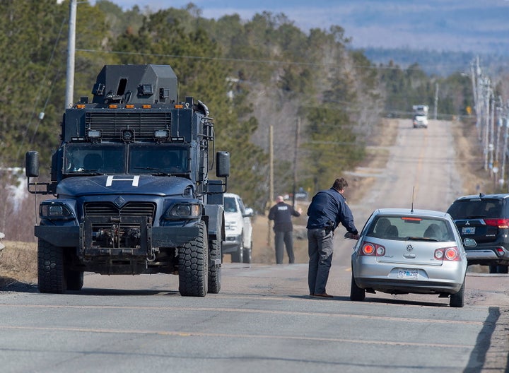 Police block the highway in Debert, N.S. on April 19, 2020 after the shooting spree ended. 