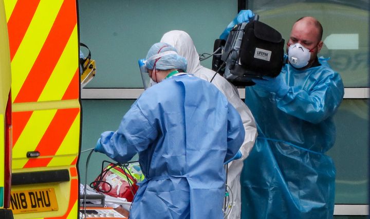 Paramedics and staff at the Royal Liverpool University Hospital wearing items of PPE as the UK continues in lockdown to help curb the spread of the coronavirus.