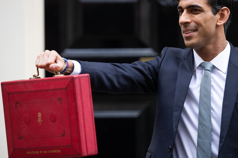 Sunak outside 11 Downing Street, London, before heading to the House of Commons to deliver his Budget.