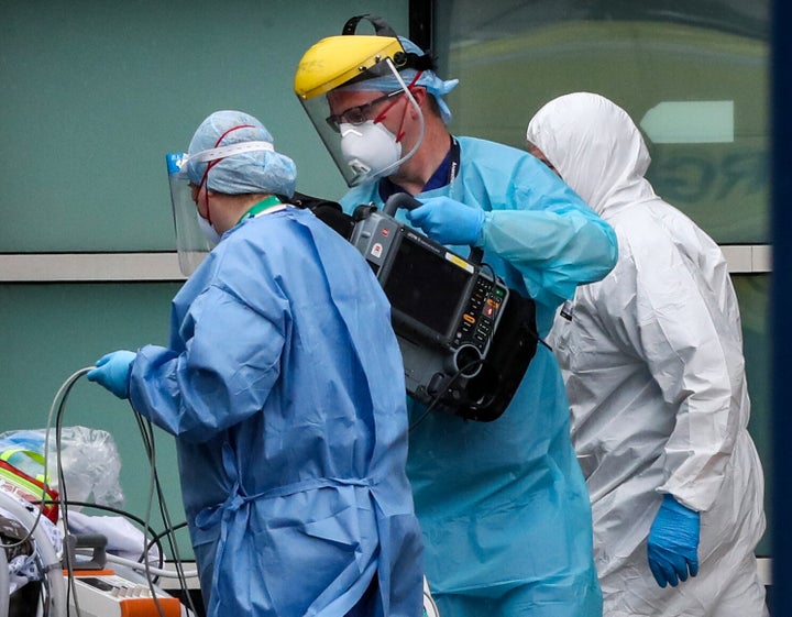 Paramedics and staff at the Royal Liverpool University Hospital wearing various items of PPE as the UK continues in lockdown to help curb the spread of the coronavirus.