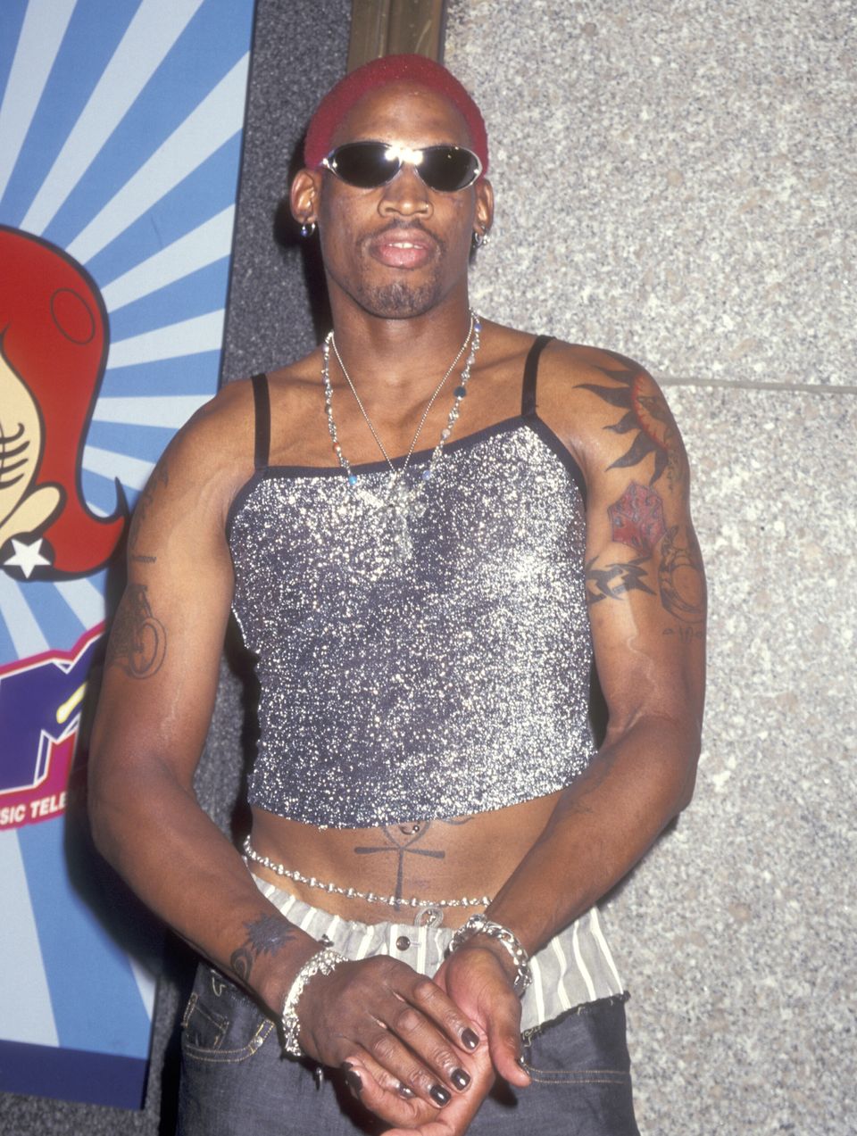 28 Photos Of Dennis Rodman's Iconic, Ridiculously Colorful Hair
