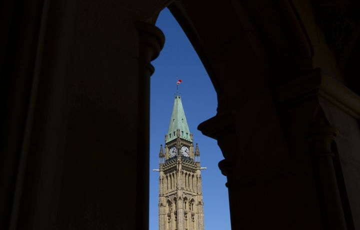 The Canada flag on the Peace Tower on Parliament Hill in Ottawa flies at half mast on April 20, 2020.