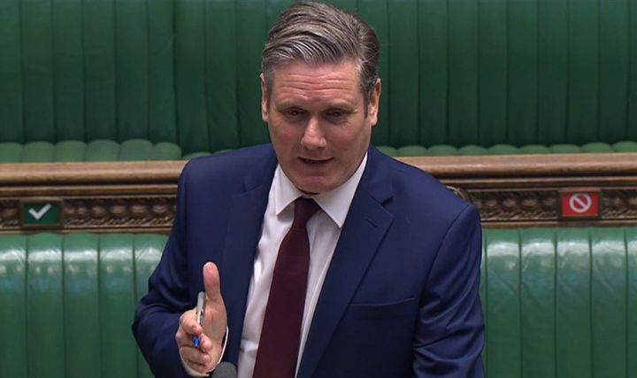Keir Starmer speaking during PMQs in the House of Commons. Most MPs took part using video technology from home.