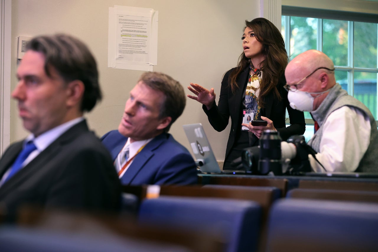 Chanel Rion, a correspondent for the cable news channel OAN, asks President Donald Trump a question in the Brady Press Briefing Room at the White House on April 6, 2020.