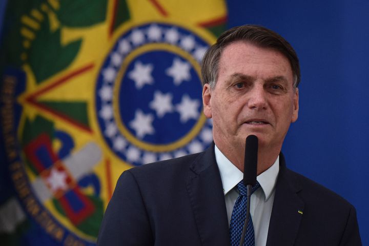 Brazilian President Jair Bolsonaro speaks during the swearing-in ceremony of his new health minister, Nelson Teich, at Planalto Palace in Brasilia on April 17, 2020. 