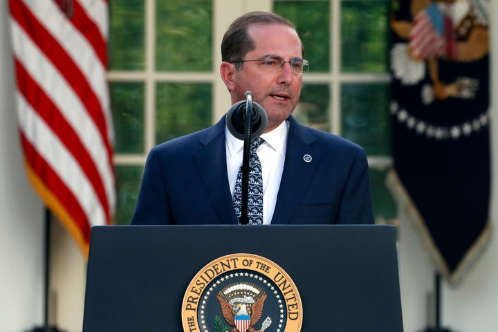 Health and Human Services Secretary Alex Azar speaks about the coronavirus at the White House on March 30. The Trump administration decided not to reopen enrollment in HealthCare.gov for people who have lost employer-based insurance.