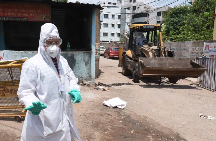A Municipal worker in PPE suit in Hindpirhi locality, a containment zone, on April 22, 2020 in Ranchi.