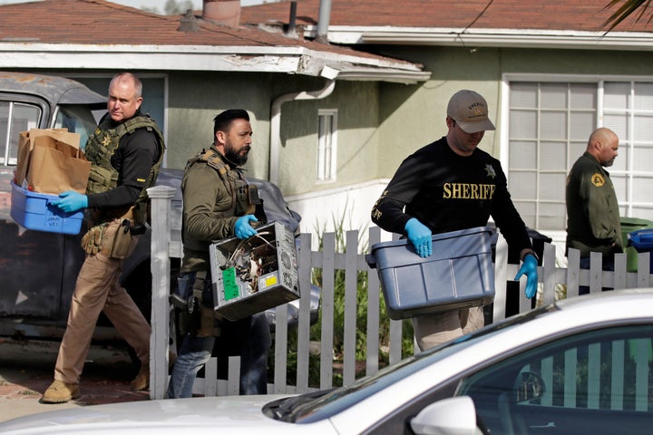 Los Angeles County Sheriff's investigators remove items from a home they searched in February in connection with the Kristin Smart cold case.