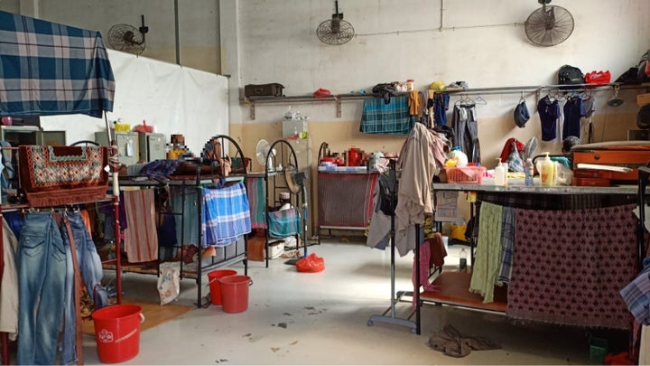 Seventeen men have been confined in this room at Kian Teck Crescent dormitory for 20 days. The men's images have been digitally obscured to protect their identities.