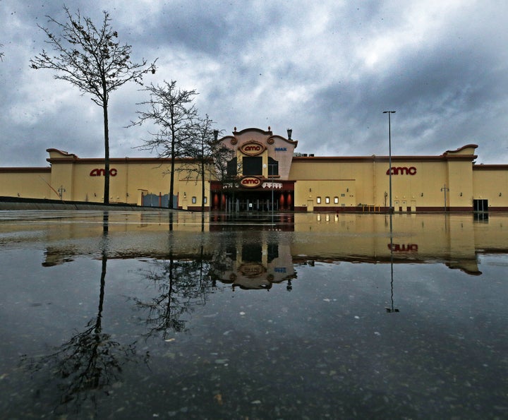 An empty parking lot at an AMC location in Methuen, Massachusetts, on March 29.