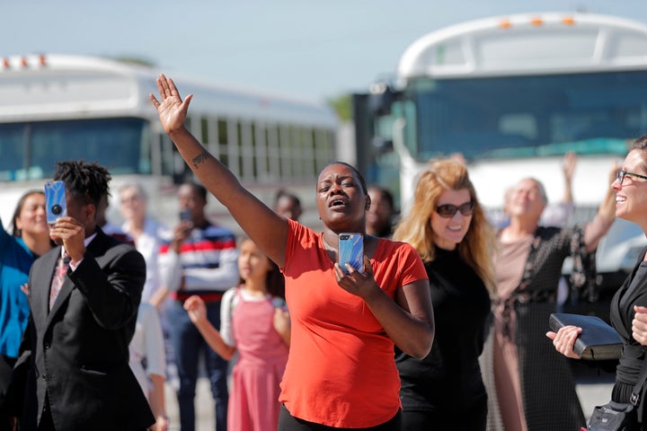 Members of the Life Tabernacle Church, as they wait for Spell to leave the East Baton Rouge Parish jail on April 21, followin