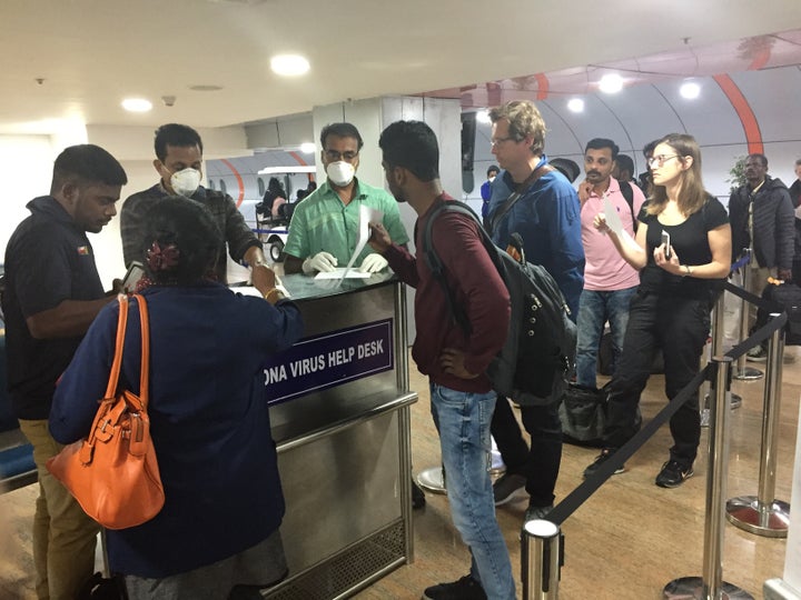 Travellers submit declarations at Trivandrum International Airport in Thiruvananthapuram (Trivandrum), Kerala, on 3 February 2020. 