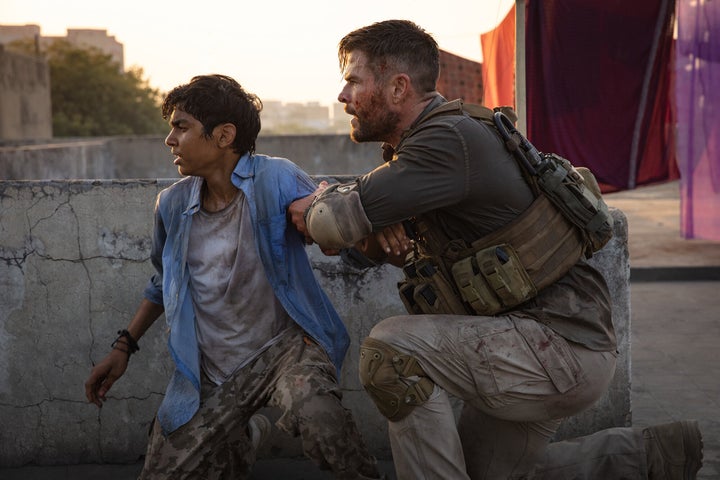 Rudhraksh Jaiswal and Chris Hemsworth act in "Extraction."