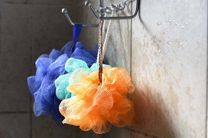 Shower poufs made of plastic need to be thoroughly cleaned after each use and shouldn't be shared.