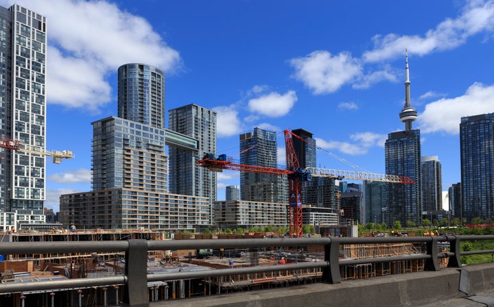 This undated file photo shows the CityPlace condo complex in downtown Toronto, with the CN Tower visible in the background, as seen from the Gardiner Expressway. 