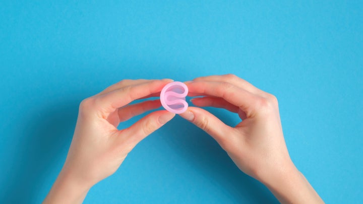 Learning how to put in a menstrual cup is challenging. Familiarize yourself with the different ways of folding a menstrual cup for insertion. (The author is a fan of the “punchdown” or “shell” fold.)