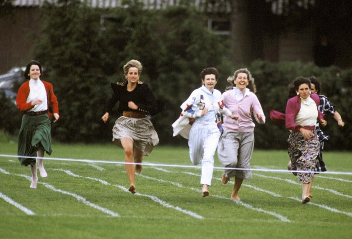 Princess Diana runs in a "mothers race" during Wetherby School's sports day in 1991.