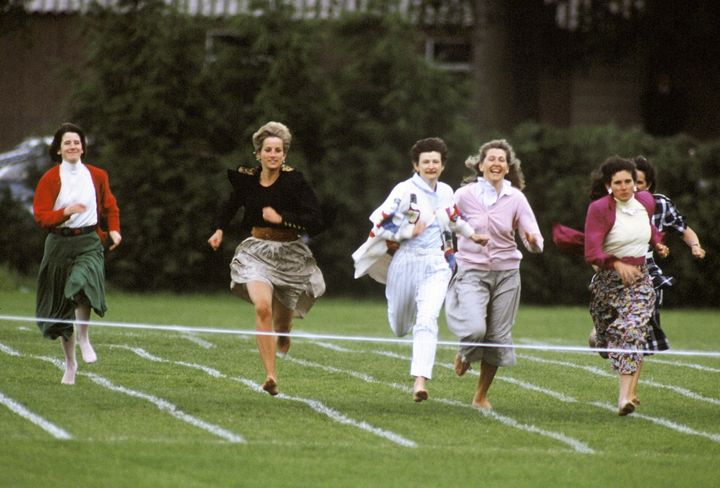 Princess Diana runs in a "mothers race" during Wetherby School's sports day in 1991.
