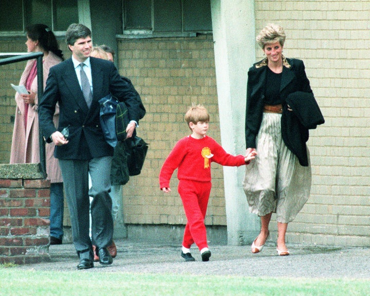 The Princess of Wales walks with Prince Harry during the Wetherby School sports day in 1991.