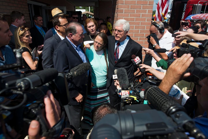 Kim Davis with attorney Mat Staver, right, in front of the Carter County Detention Center on Sept. 8, 2015, in Grayson, Kentucky, during a rally for the county clerk who refused to issue marriage licenses to same-sex couples.