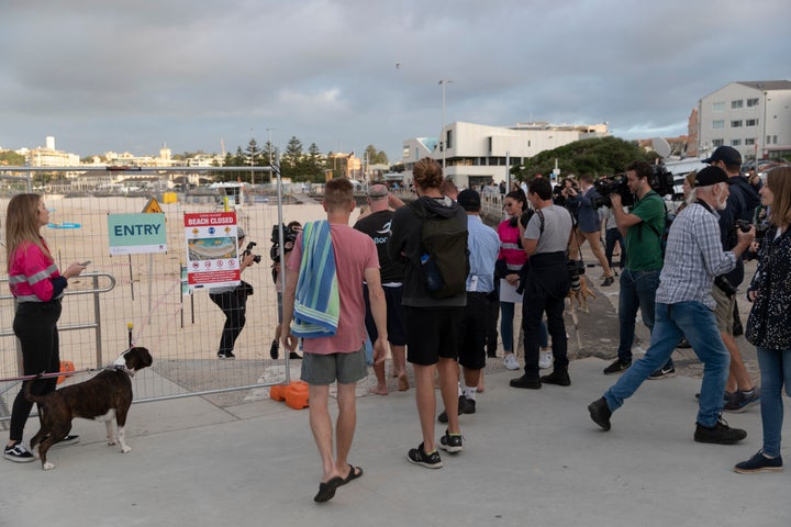 The first swimmers return to Bondi beach on April 28, 2020 in Sydney, Australia. (Photo by Brook Mitchell/Getty Images)