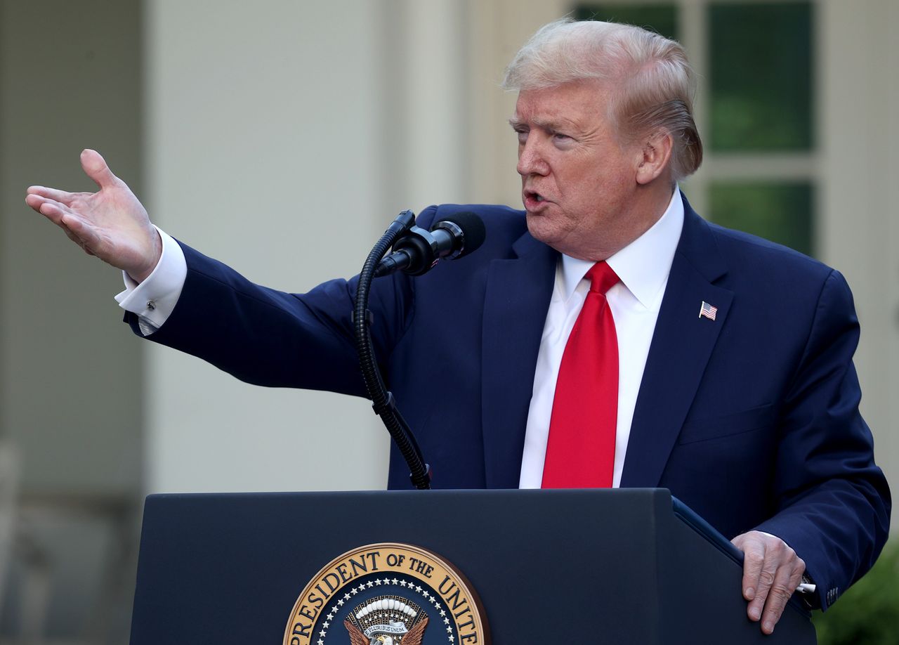 President Donald Trump answers questions during the daily briefing of the coronavirus task force in the Rose Garden of the White House on April 27 