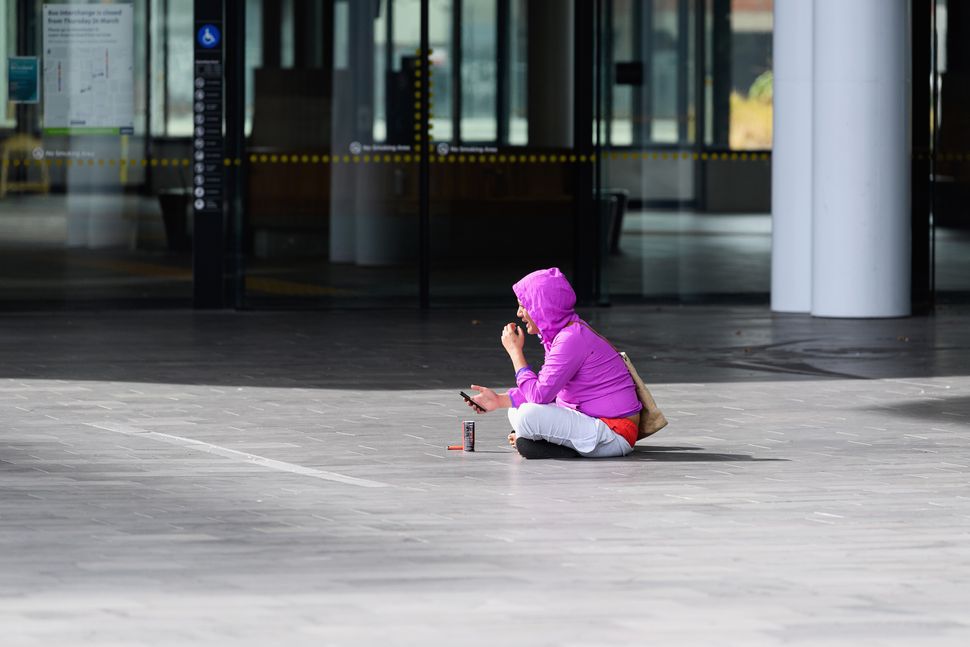 A homeless woman on March 26 in Christchurch, New Zealand.
