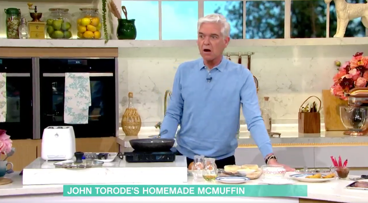 Phillip Schofield noticed John Torode's tea towel was on fire