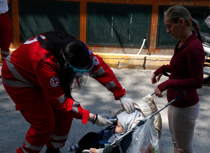 (AP Photos/Thanassis Stavrakis)