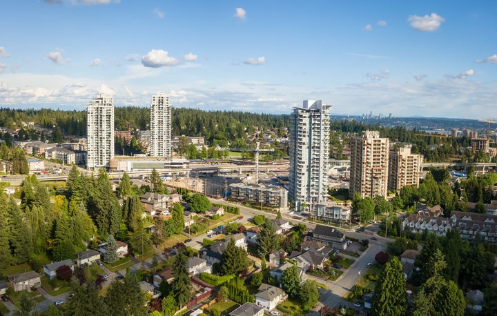 An aerial view of condo towers surrounded by low-rise homes in the Greater Vancouver city of Port Moody, B.C. Canada's home prices are expected to remain resilient in the face of the COVID-19 economic crisis.