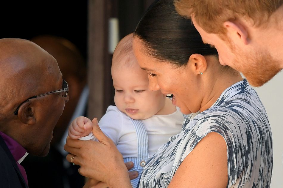 A close-up of Archie meeting Desmond Tutu.