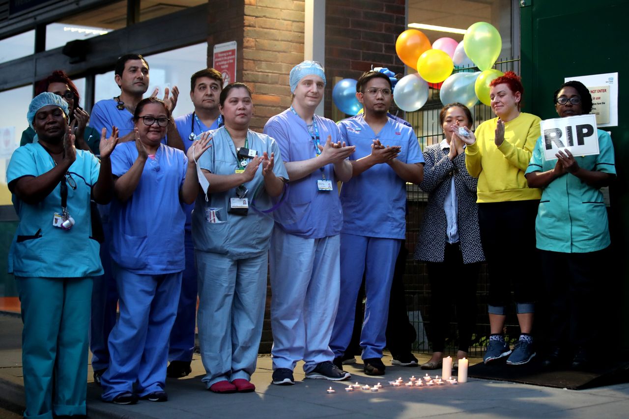 NHS workers clap outside Newham University Hospital on April 23.