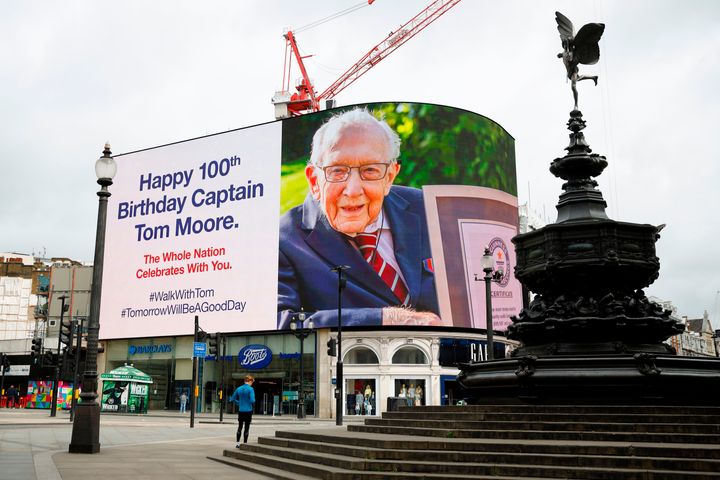 A birthday message for Colonel Tom Moore (who was promoted from captain on Thursday) is displayed on the advertising boards in Piccadilly Circus in London.
